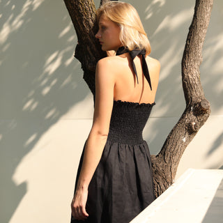 Back view black linen midi dress