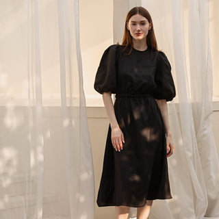 Black linen midi dress with puffed sleeves and open back