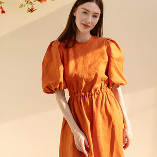 Orange linen summer dress with puffed sleeves
