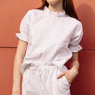 White linen summer top with short puffed sleeves