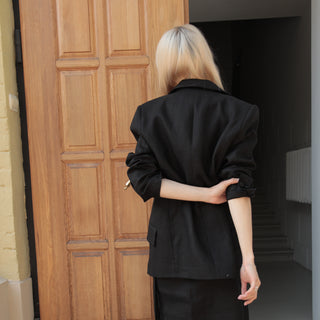 Back of black linen blazer