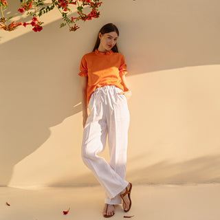 Orange linen summer top with puffed short sleeves