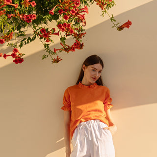 Linen orange summer shirt with puffed sleeves
