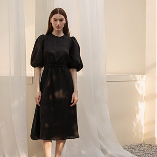Black linen midi dress with puffed sleeves and open back