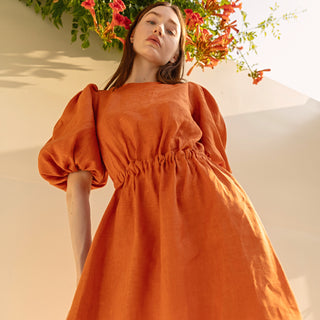 Linen summer dress with puffed sleeves and open back