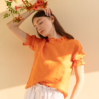 Orange linen top with puffed sleeves
