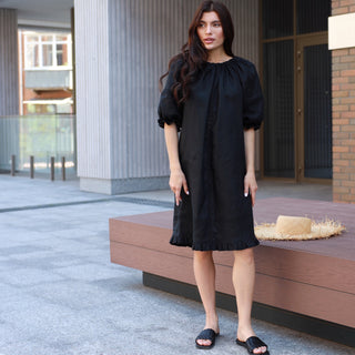 Black linen midi dress with short balloon sleeves and open back