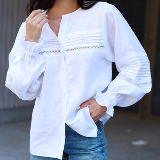 White linen shirt with pleats and lace