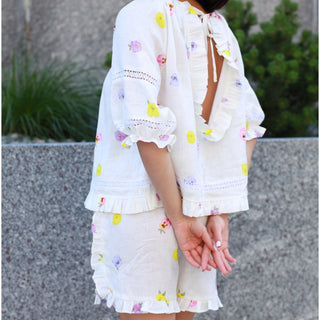 White Natural Linen Shorts with Floral Print, Frilled Details and Pockets 'May'