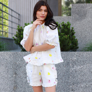 White Natural Linen Shorts with Floral Print, Frilled Details and Pockets 'May'