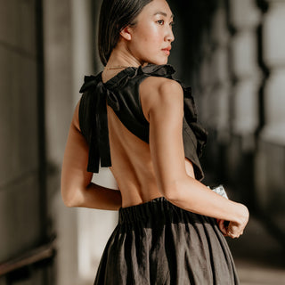 Back view black linen maxi dress with open back