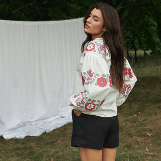 Side view white linen Ukrainian embroidered blouse