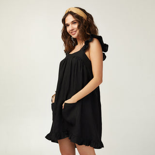 Side view black linen mini sundress with pockets