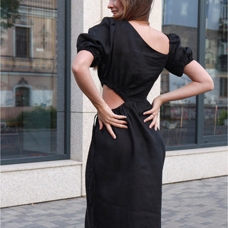 Back view black linen midi dress with side cut out details