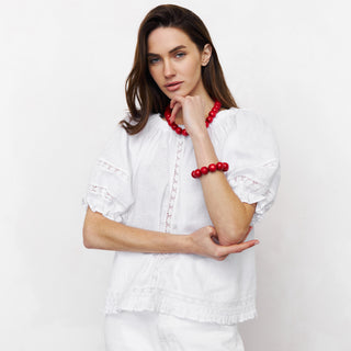 White linen summer blouse with lace details