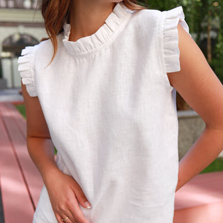 White linen top with frilled details